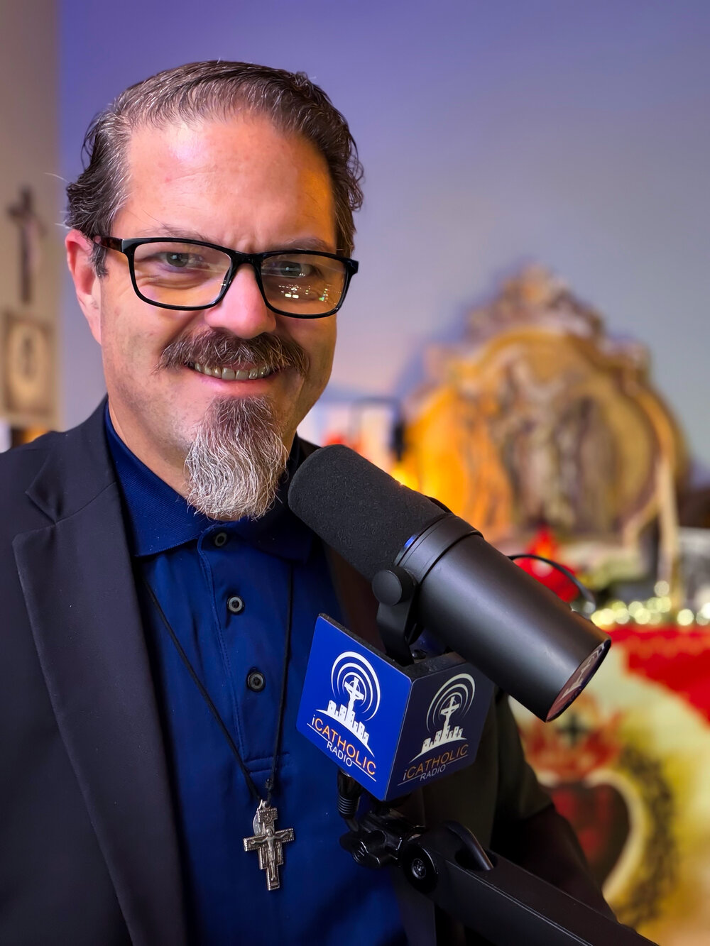 Joe McClane behind the iCatholicRadio microphone in the A Catholic Take studio