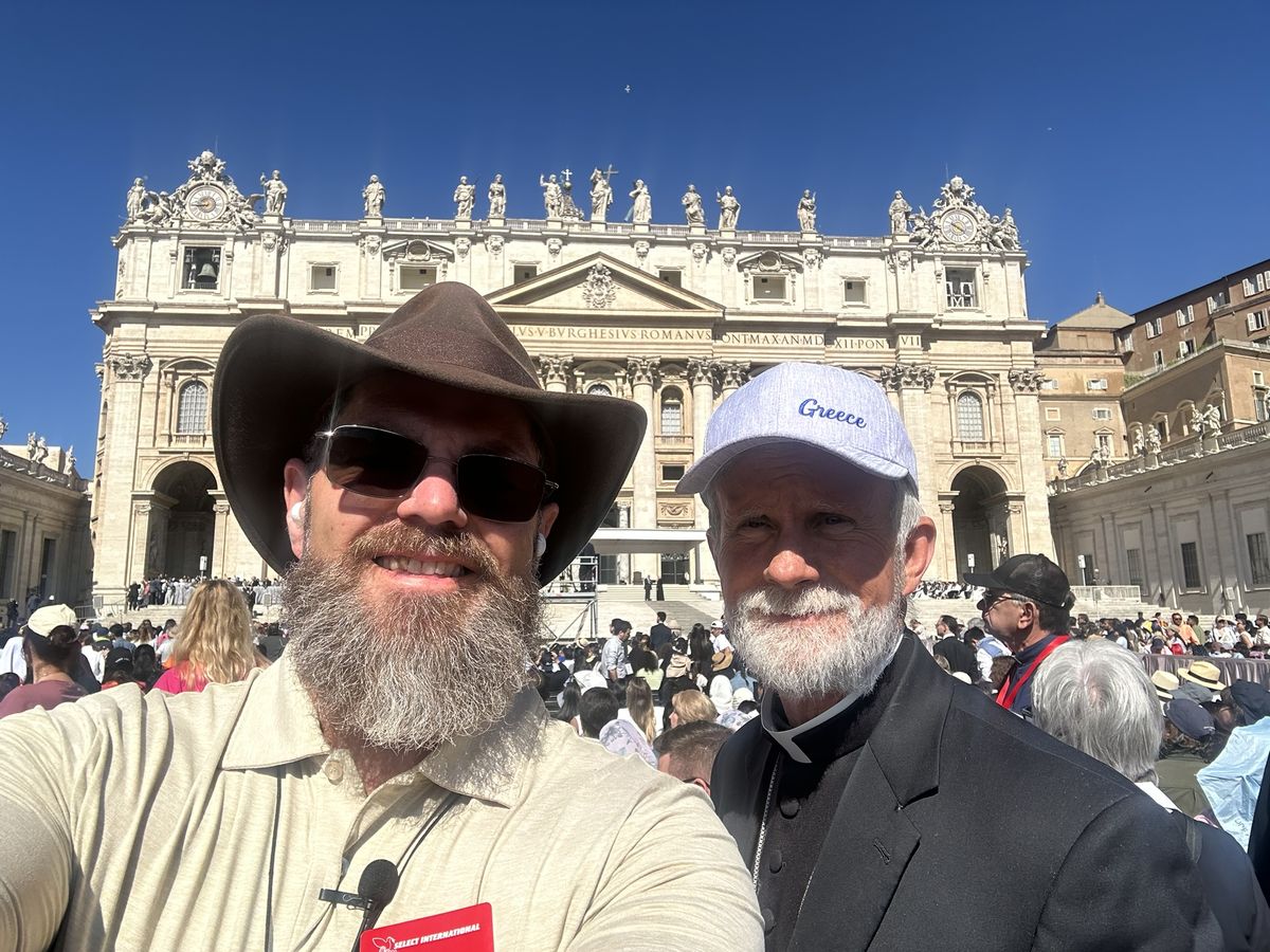 Joe McClane with Bishop Joseph Strickland in front of St. Peter's Basilica, Rome