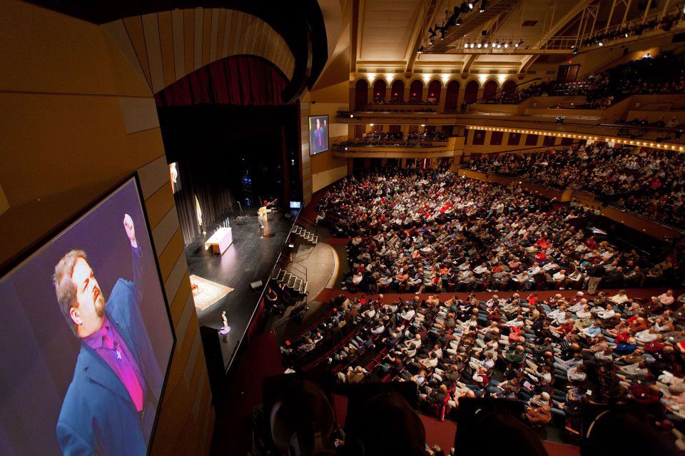 Joe McClane on the big screens before thousands of men at the Men of Christ conference in Milwaukee