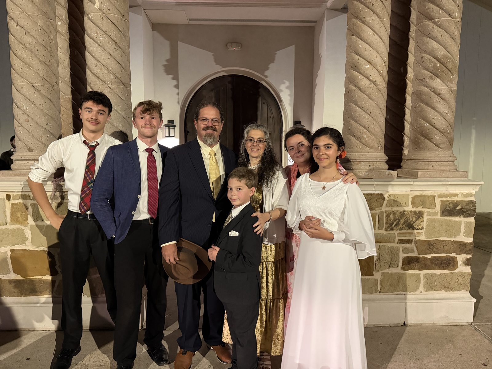 Joe and Michelle McClane with their family outside the church